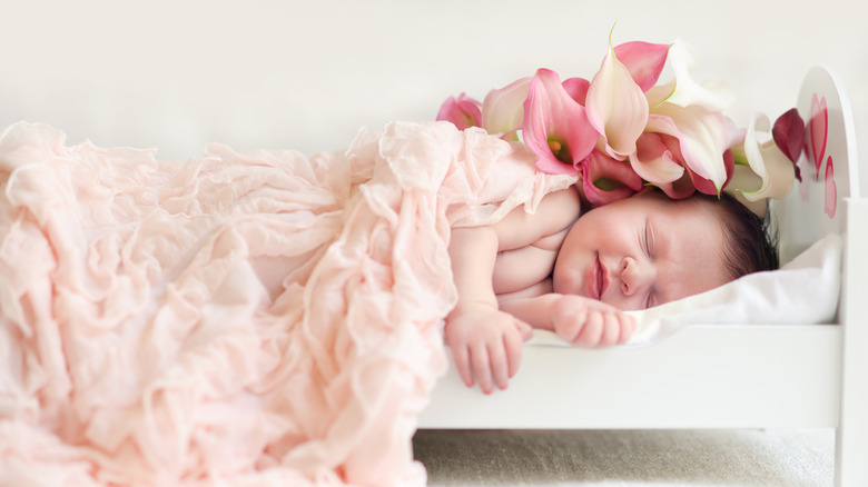 sleeping baby with calla lilies
