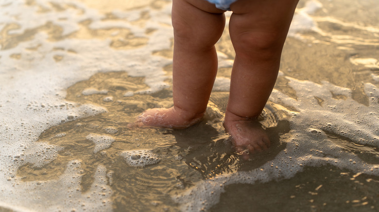Baby feet in water