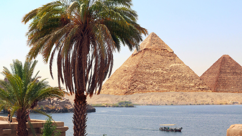 Nile River with pyramids in the background