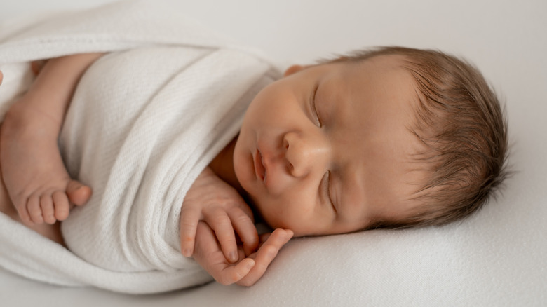 A newborn sleeping