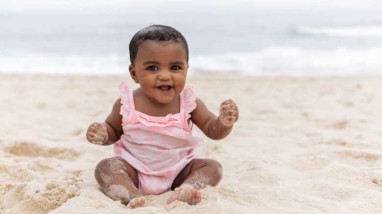 baby girl on the beach