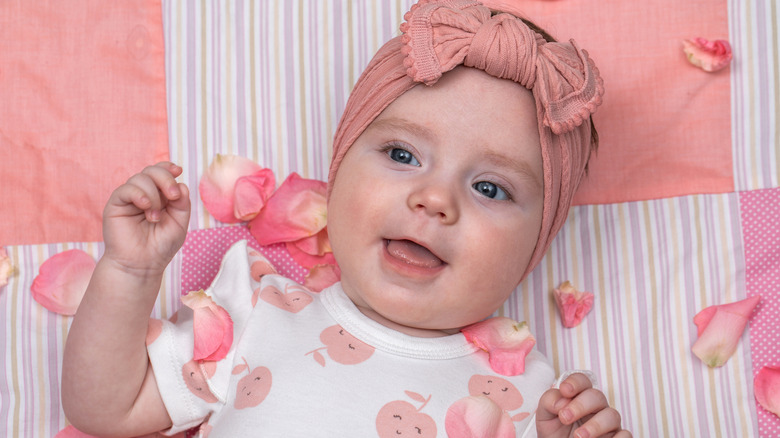A baby girl in pink