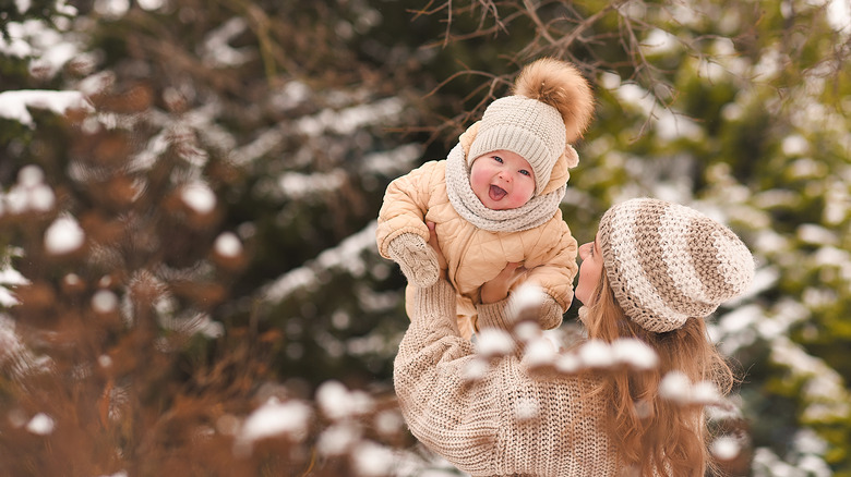 happy baby during a winter scene