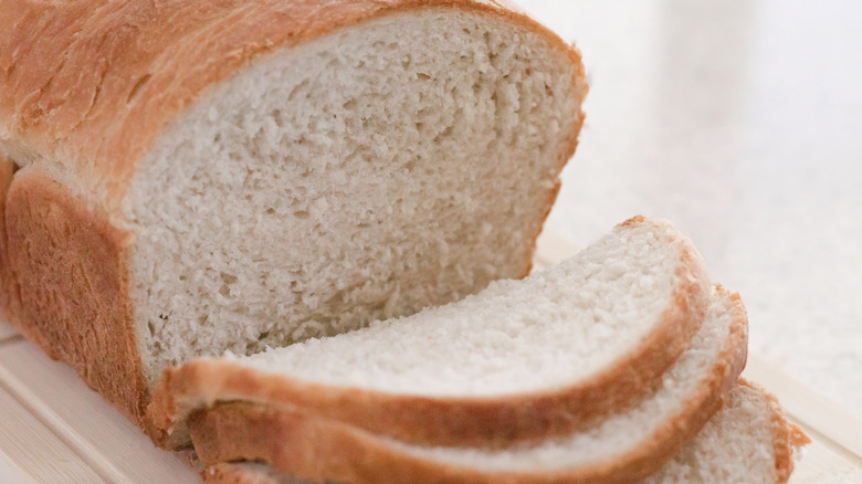 A close up of a sliced bread loaf