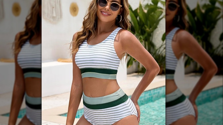 Woman in two piece striped swimsuit