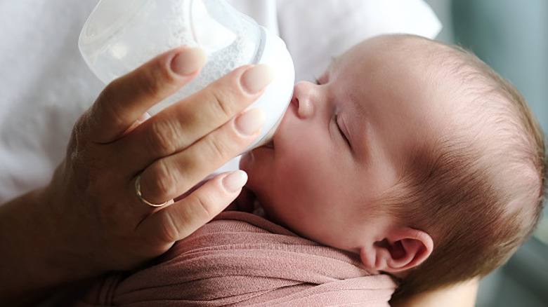 Baby drinking a bottle