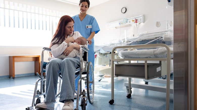 New mom getting wheeled out of hospital