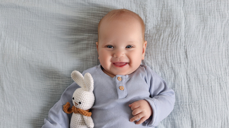 baby boy smiling at camera