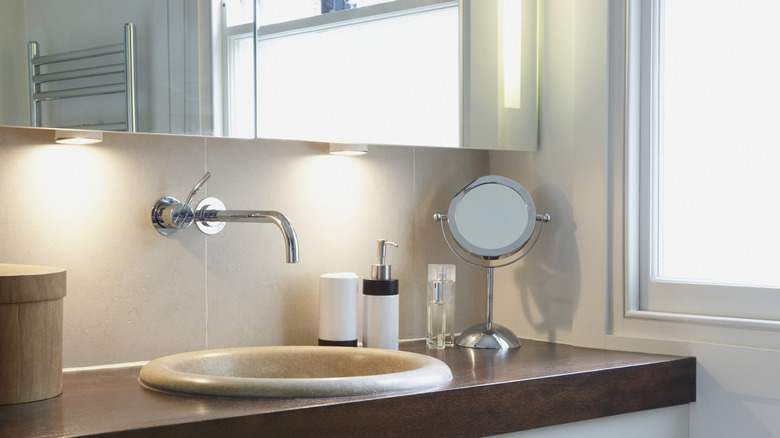 beautiful lighting in a small bathroom