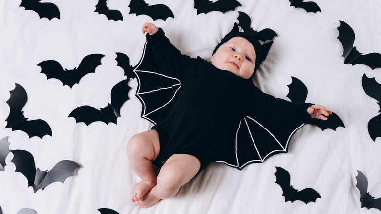 Baby dressed in a bat costume