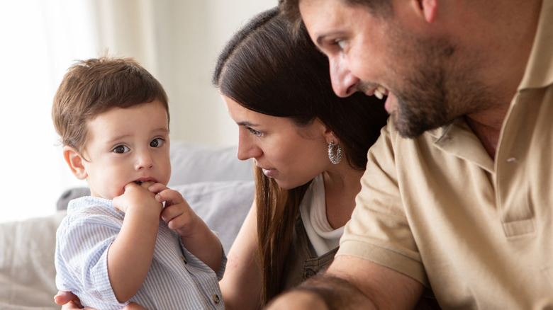 little boy with his parents