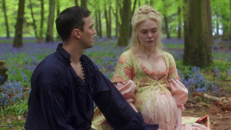 Pregnant Catherine (Elle Fanning) speaking to her husband in a scene from The Great