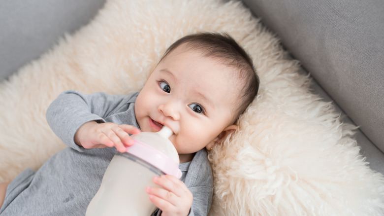 Baby drinking from bottle