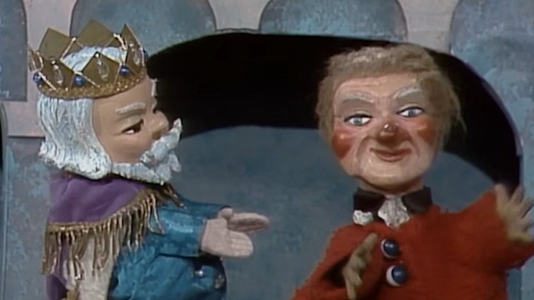 Lady Elaine Fairchilde (right) talks to King Friday (left)