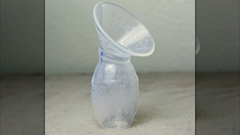 close-up of a Haakaa pump with milk in it