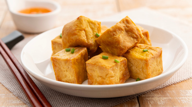 Crispy air fried tofu in a white bowl