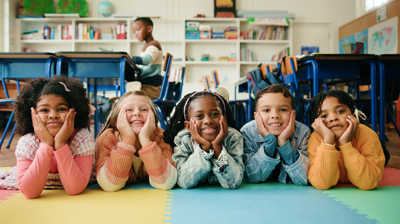 group of smiling boys and girls