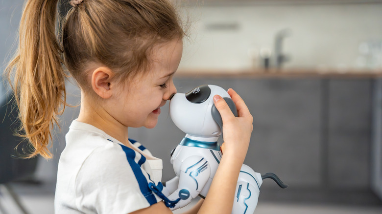 Kid hugging a toy dog