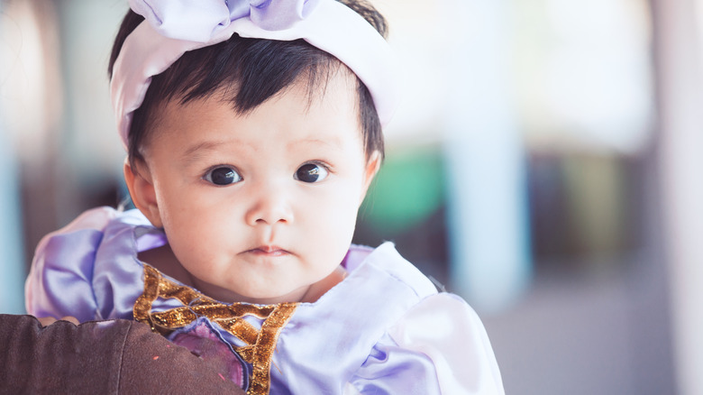 baby girl in a princess costume