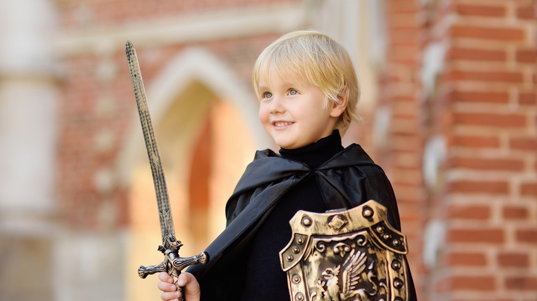 little boy dressed as a knight