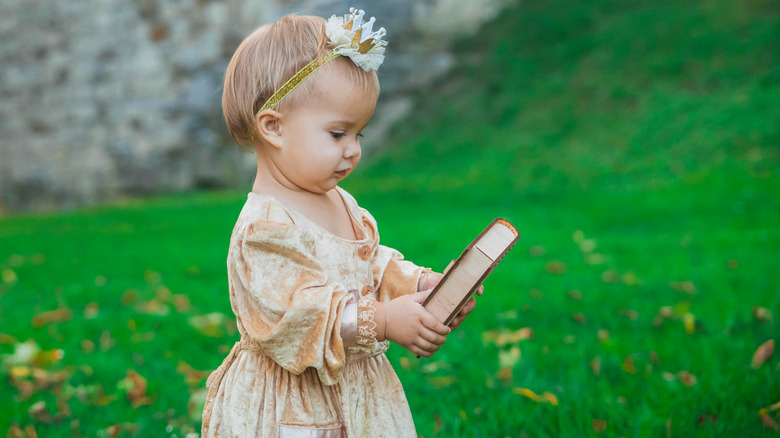 baby girl in medieval costume