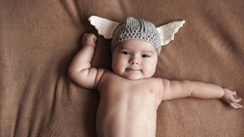 baby boy in a knit viking hat