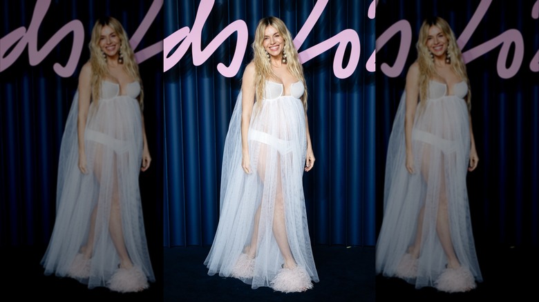 Sienna Miller in a sheer white tulle gown