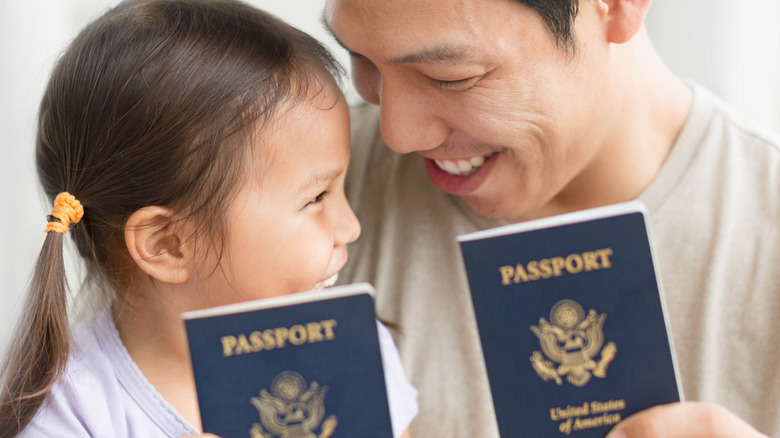 father and daughter with American passports
