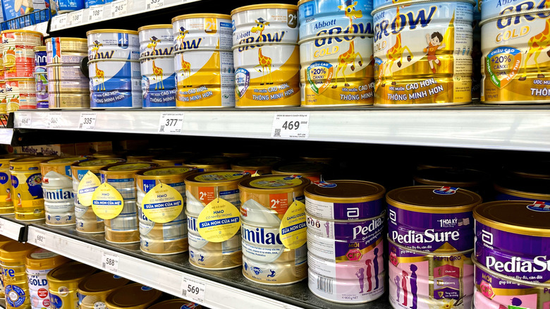 Cans of formula on the shelf