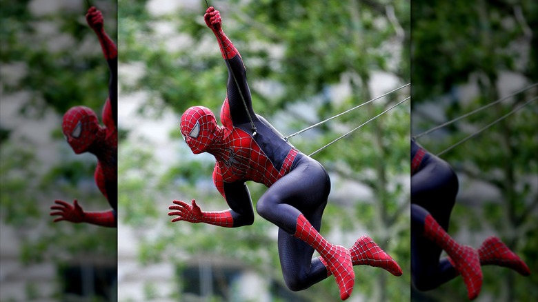 Spider-Man swinging in movie scene