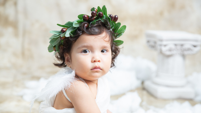 baby dressed as a cherub