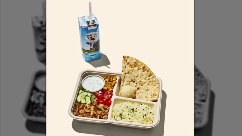 Cava kids' build-your-own meal with milk.
