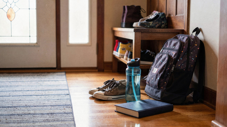 children's items ready to go by the front door