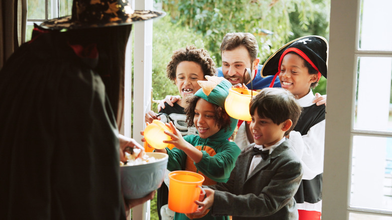 trick-or-treaters at the door on Halloween