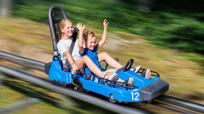Kids laughing on roller coaster