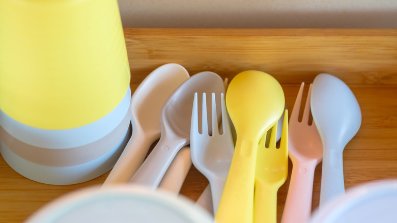 children's utensils in a stackable drawer organizer