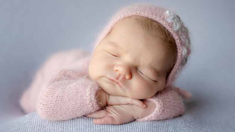 sleeping newborn girl