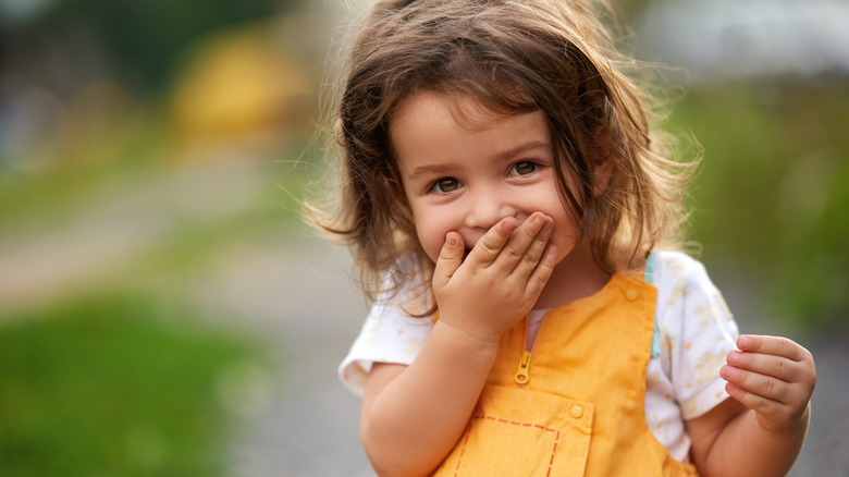 little girl looking surprised