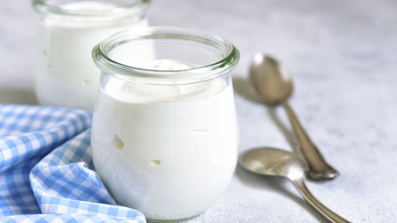 Glass jars of yogurt