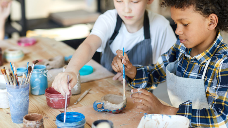 kids doing a painting project