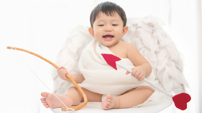 baby with a bow and arrow